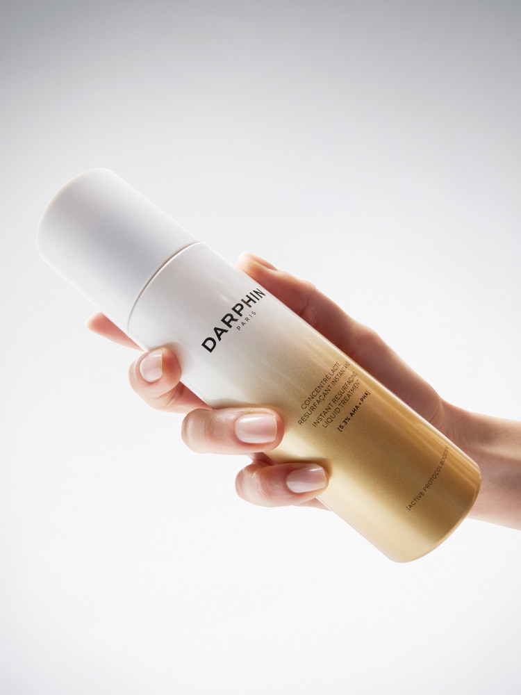 INSTANT RESURFACING LIQUID TREATMENT A concentrated resurfacing liquid treatment to help dissolve pore-clogging buildup and reveal a smoother, more luminous and youthful-looking complexion. As light as an essence, as potent as a serum. For visibly transformative results.